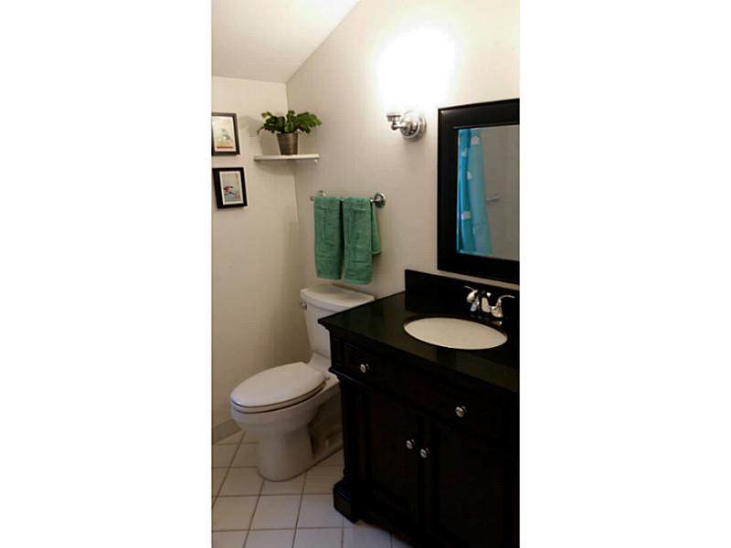 76 Meadowbrook Road East Greenwich, RI 02818 - Photo 9 of 17 Bathroom. 2nd floor full bath with tub.Ceramic tile floor subway tile bath surround. High quality vanity