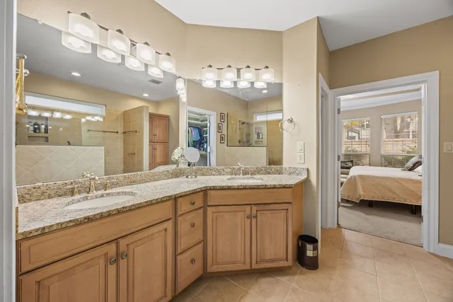 a view of a livingroom with workspace and a window