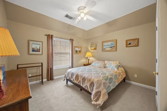 a view of a hallway with front door