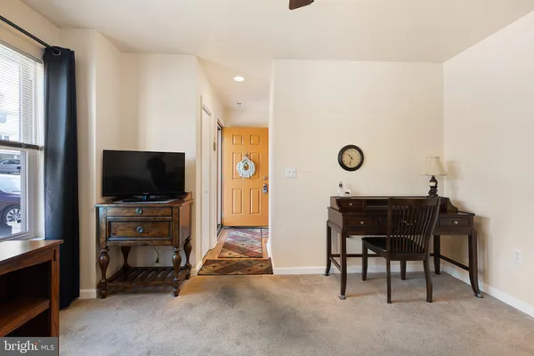 a view of a livingroom with furniture