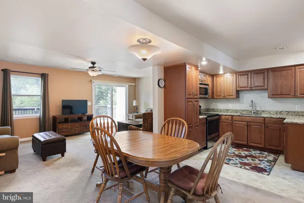 a view of a dining room with furniture