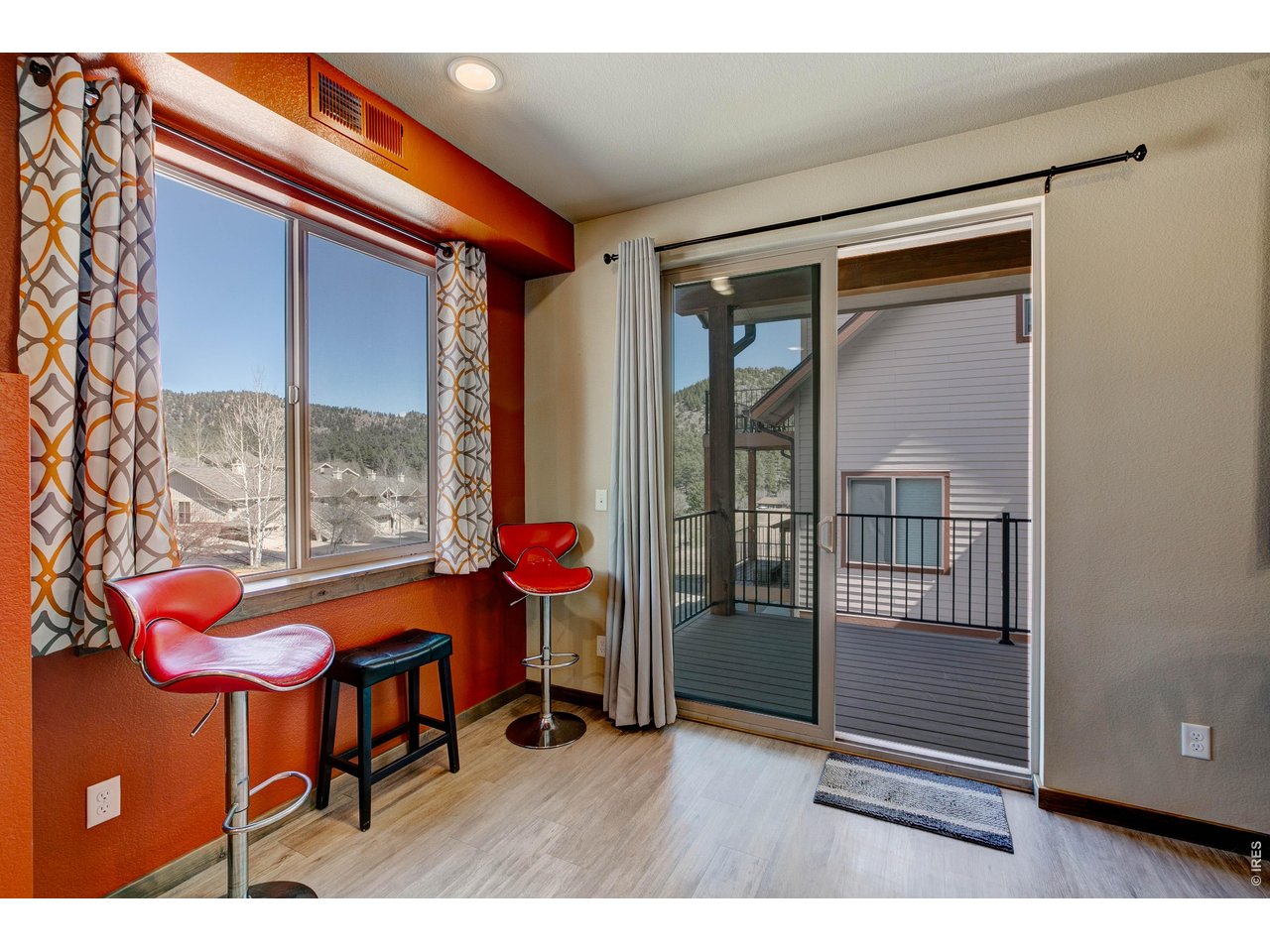1802 Wildfire Road, Unit 204 Estes Park, CO 80517 - Photo 14 of 37 a backyard of a house with outdoor seating