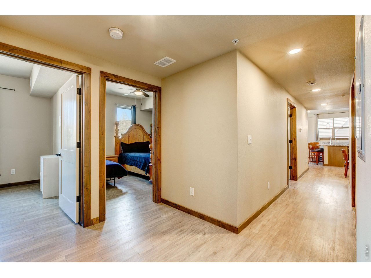 1802 Wildfire Road, Unit 204 Estes Park, CO 80517 - Photo 17 of 37 a view of a hallway view with wooden floor and furniture