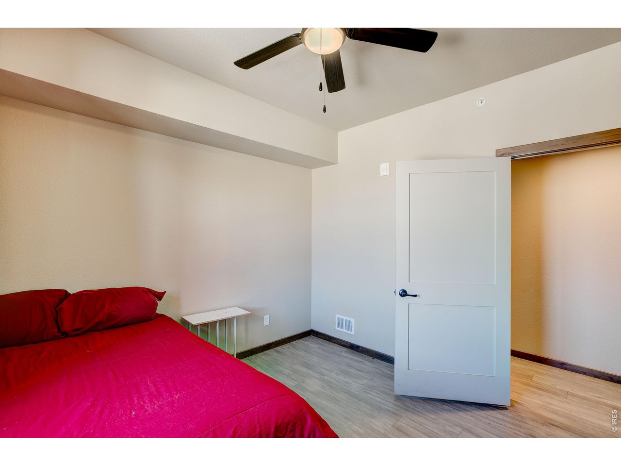 1802 Wildfire Road, Unit 204 Estes Park, CO 80517 - Photo 21 of 37 a view of room with hardwood floor and cabinet