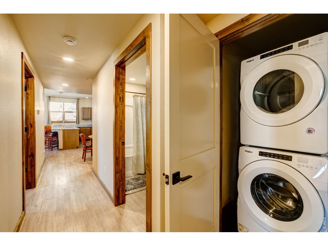 1802 Wildfire Road, Unit 204 Estes Park, CO 80517 - Photo 24 of 37 a view of a hallway with washer and dryer