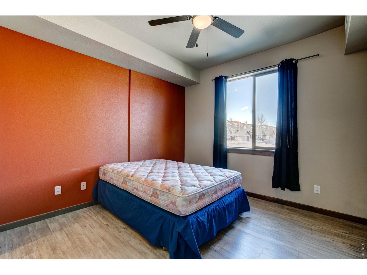 1802 Wildfire Road, Unit 204 Estes Park, CO 80517 - Photo 26 of 37 a room with a bed and window