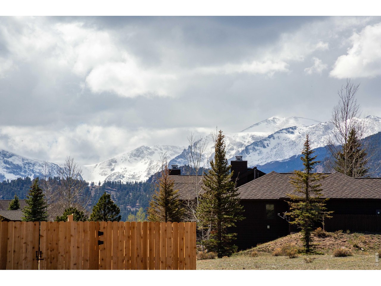 1802 Wildfire Road, Unit 204 Estes Park, CO 80517 - Photo 26 of 35 a view of a backyard of the house