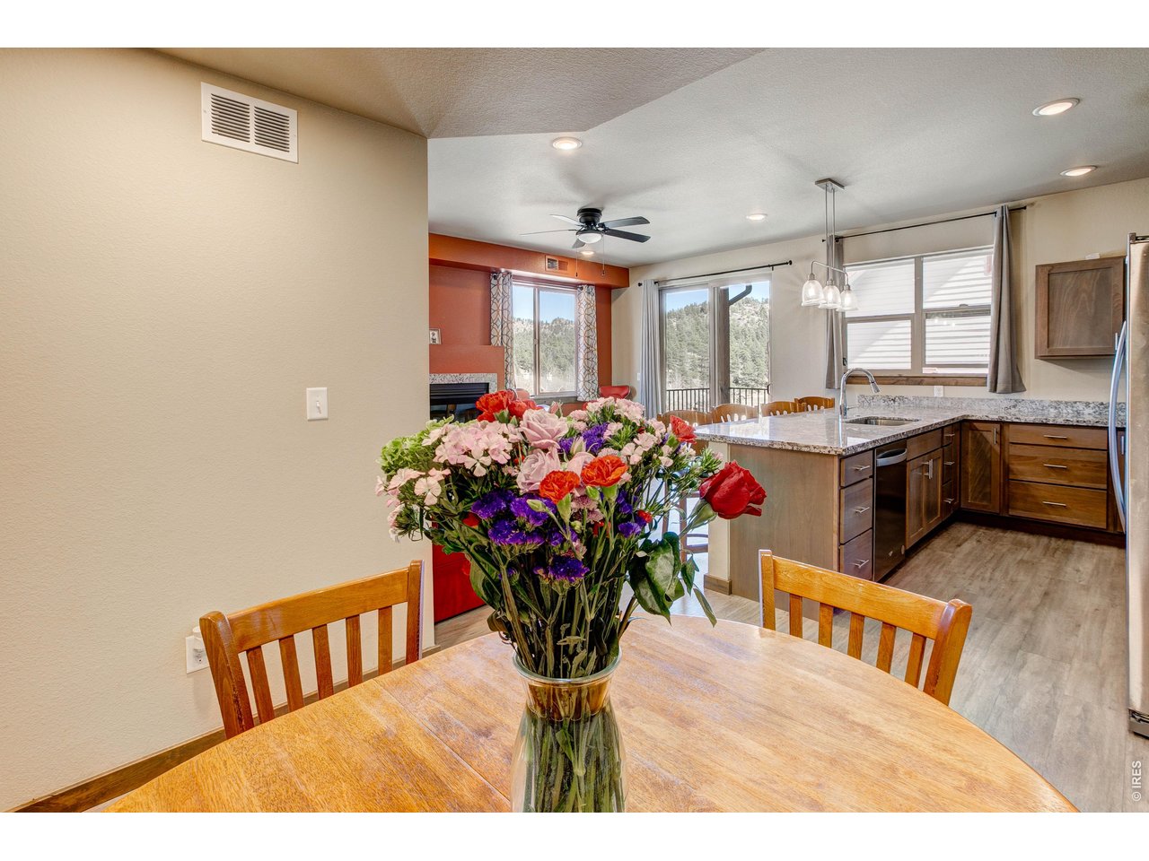 1802 Wildfire Road, Unit 204 Estes Park, CO 80517 - Photo 5 of 35 a kitchen with furniture and window