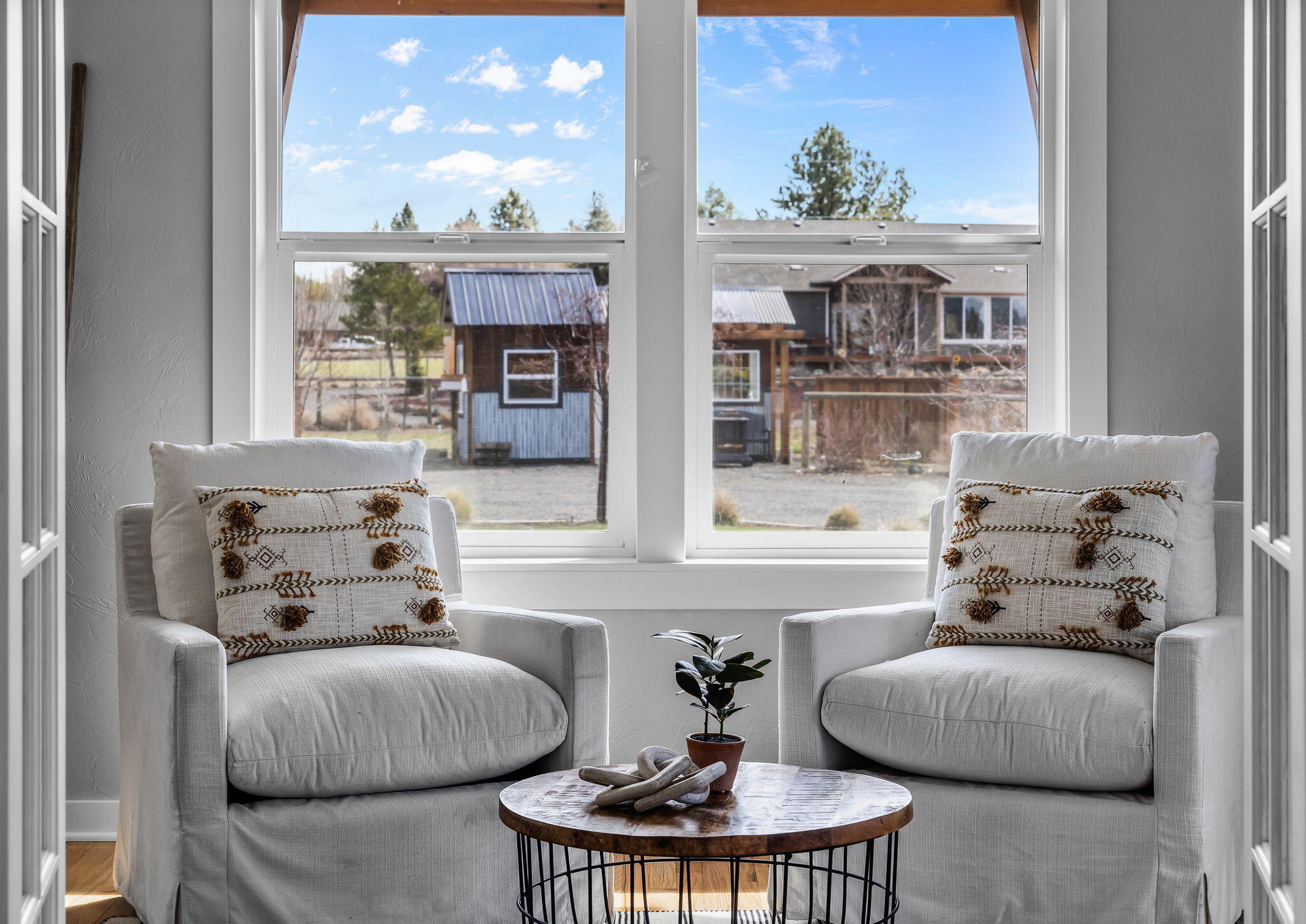 61600 Ward Road Bend, OR 97702 - Photo 21 of 52 a living room with furniture and a large window