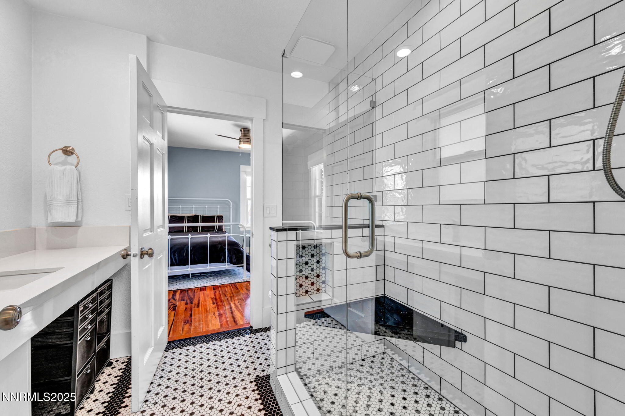 960 Ralston Street Reno, NV 89503 - Photo 18 of 59 a bathroom with a sink a toilet a mirror and shower