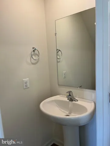a sink with a mirror