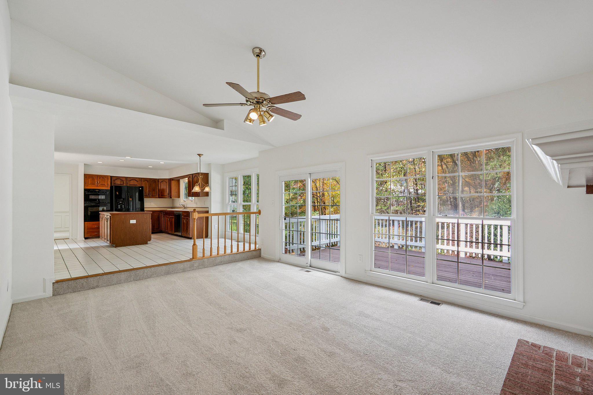15056 Brown Post Lane Centreville, VA 20121 - Photo 17 of 45 a big room with chandelier and windows