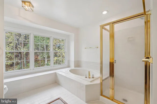 a bathroom with a bathtub and a sink