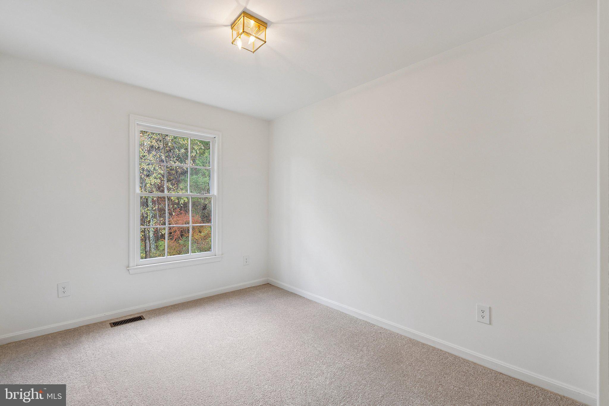 15056 Brown Post Lane Centreville, VA 20121 - Photo 27 of 45 an empty room with a window