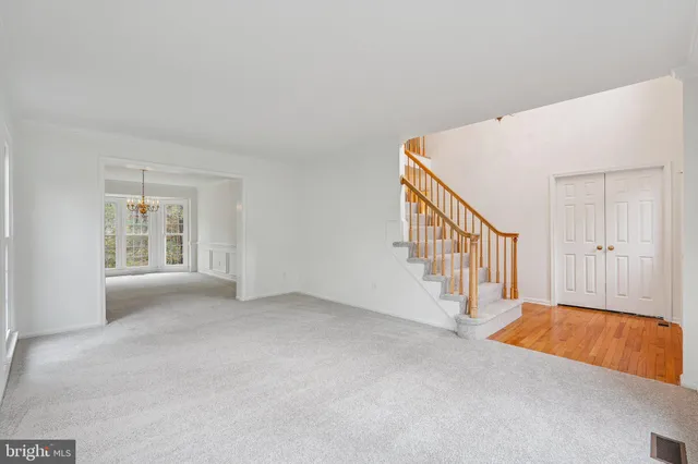 a view of an empty room with windows