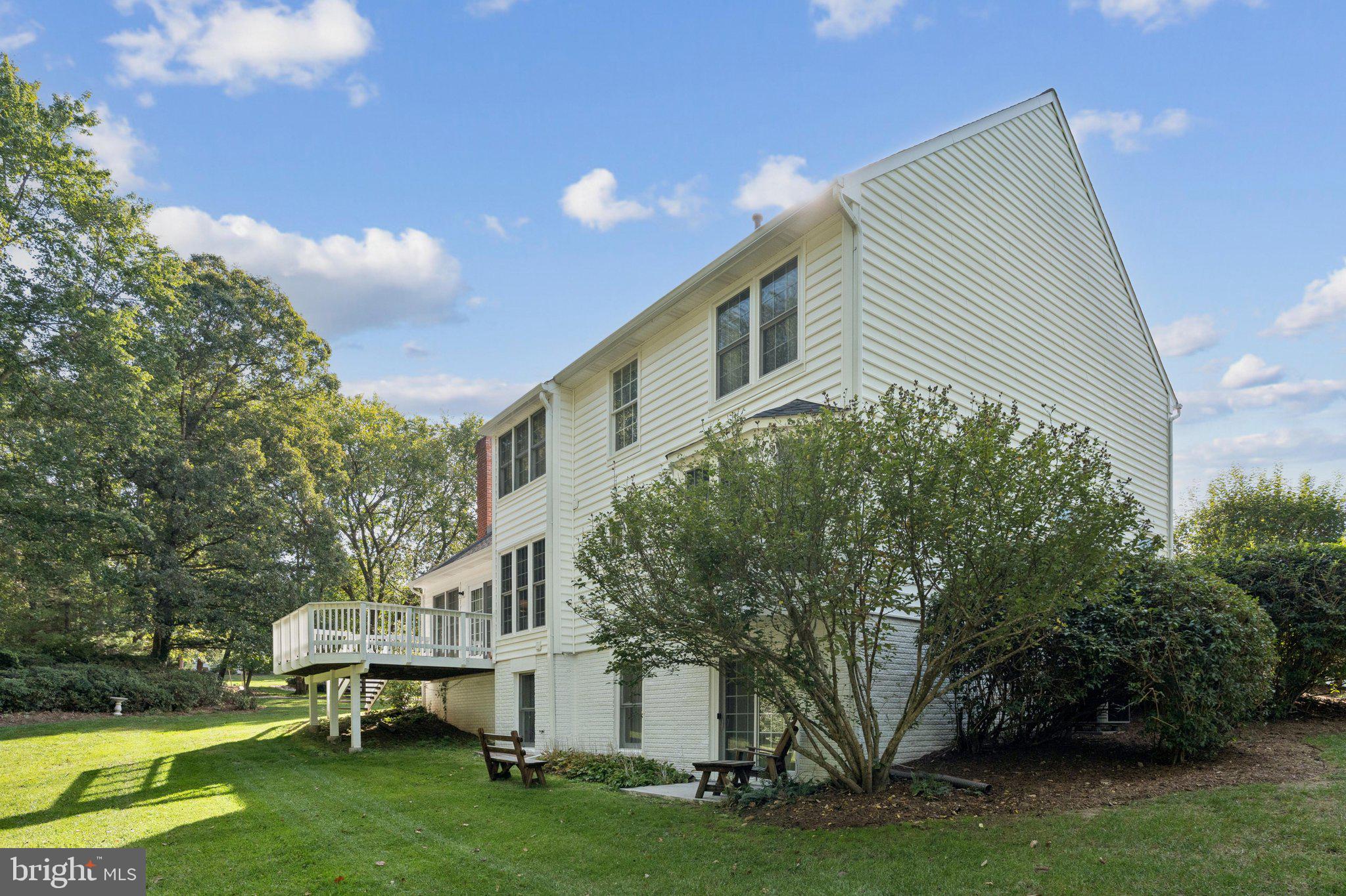 15056 Brown Post Lane Centreville, VA 20121 - Photo 42 of 45 a front view of a house with garden