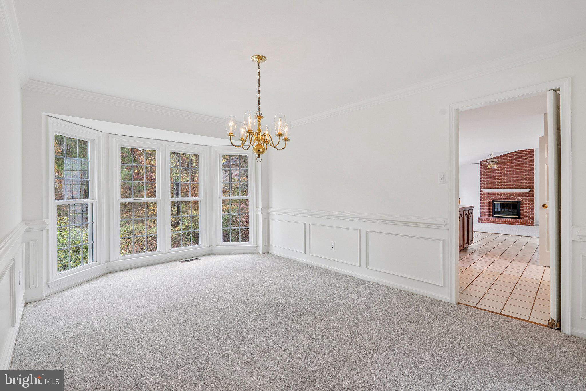 15056 Brown Post Lane Centreville, VA 20121 - Photo 8 of 45 a view of an empty room with a window