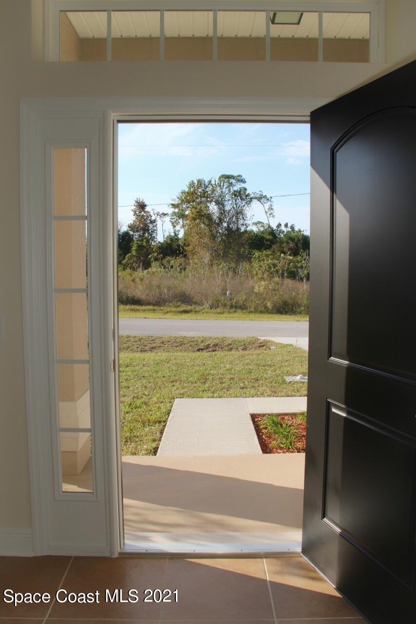 784 Moment Circle Cocoa, FL 32926 - Photo 3 of 14 a view of a room with a large window