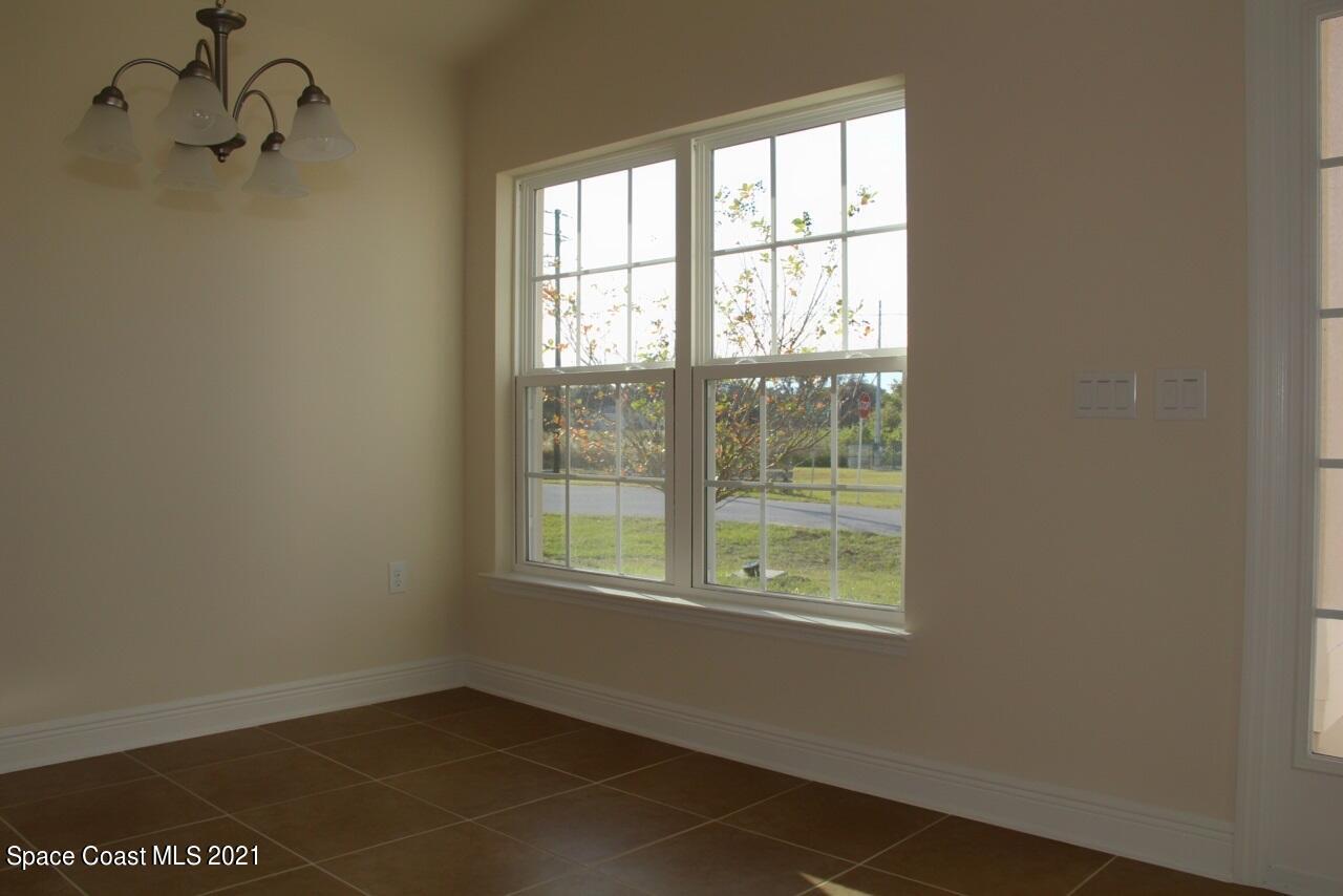 784 Moment Circle Cocoa, FL 32926 - Photo 4 of 14 a view of a room that has a window in it
