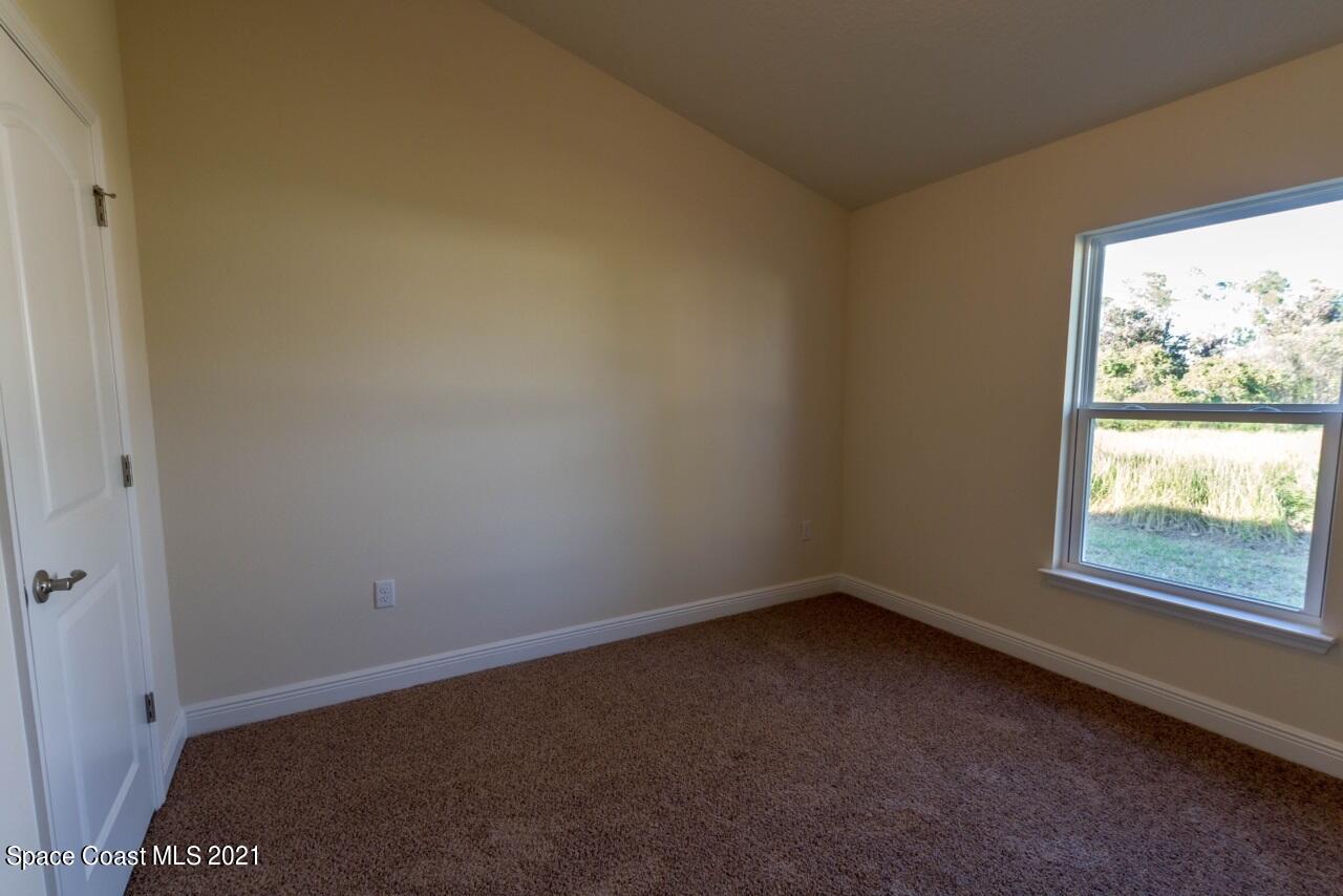 784 Moment Circle Cocoa, FL 32926 - Photo 9 of 14 an empty room with a window