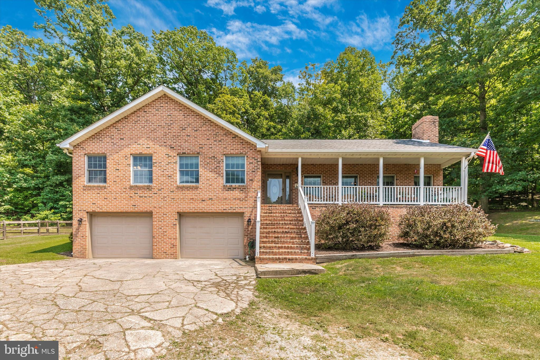 Brick front home on 10 very private acres