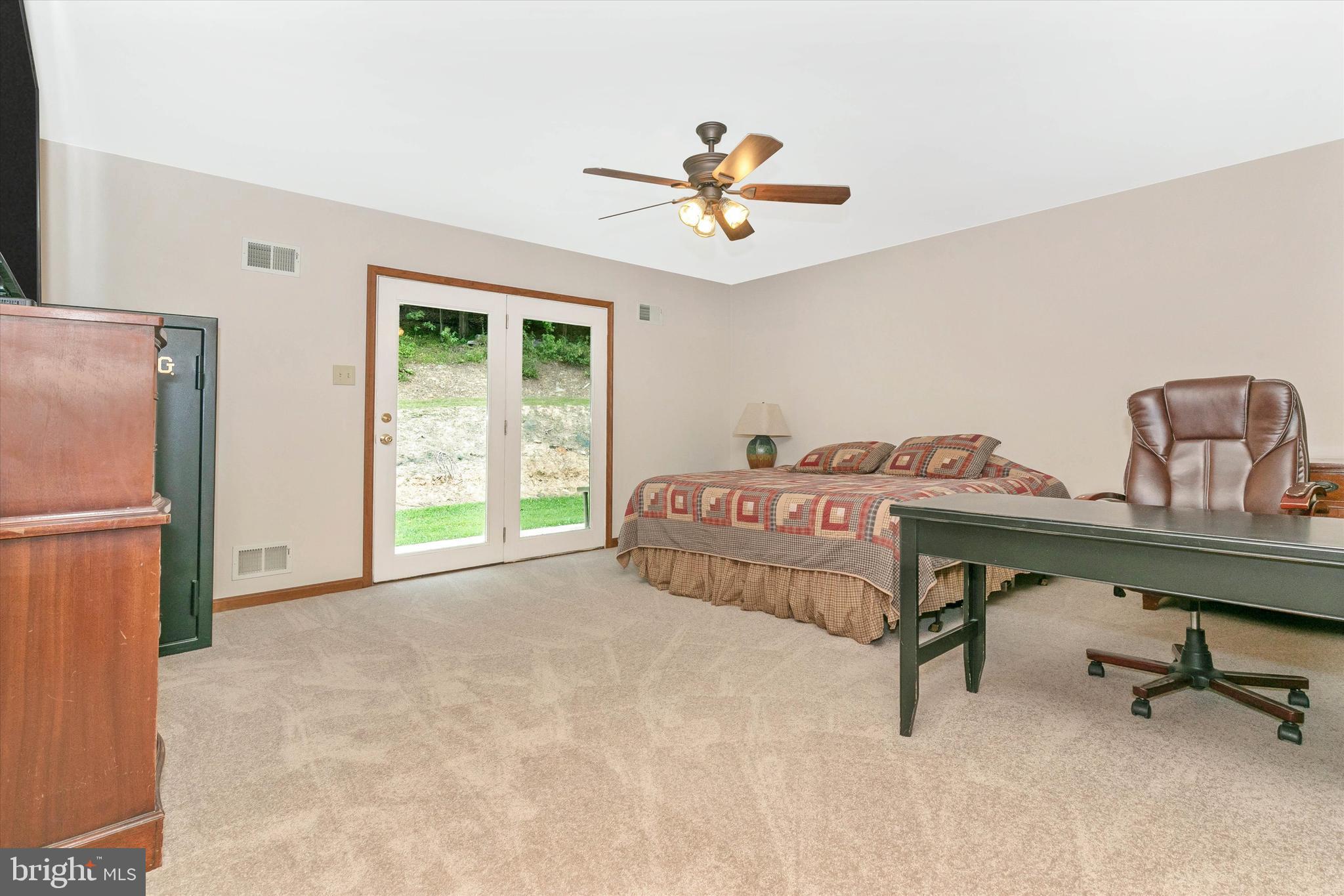 20804 Townsend Road Rohrersville, MD 21779 - Photo 29 of 49 Primary bedroom leads to back porch