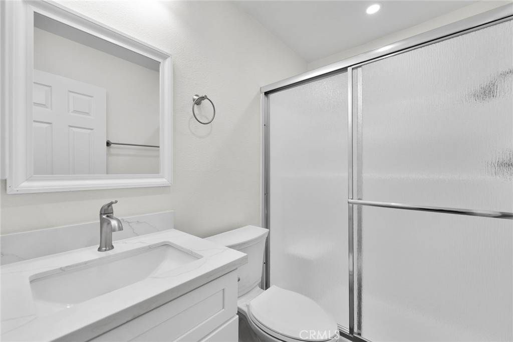 711 West 1st Street Santa Ana, CA 92701 - Photo 11 of 23 a bathroom with a sink toilet and shower
