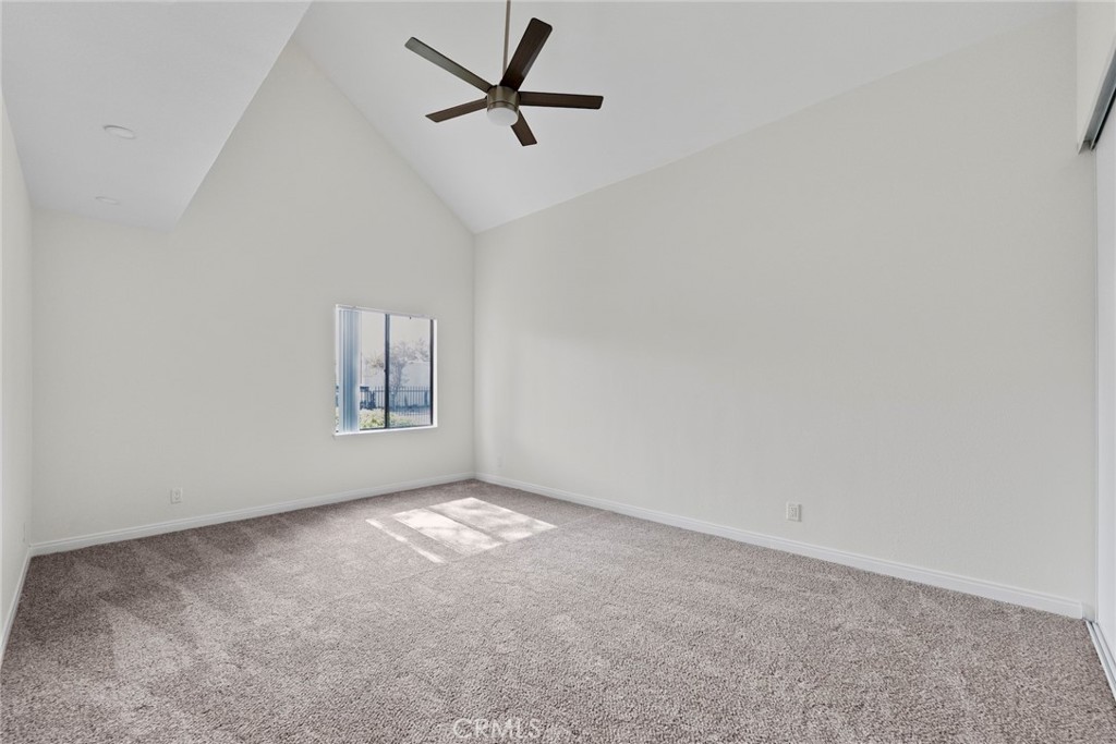 711 West 1st Street Santa Ana, CA 92701 - Photo 13 of 23 an empty room with a window and a fan