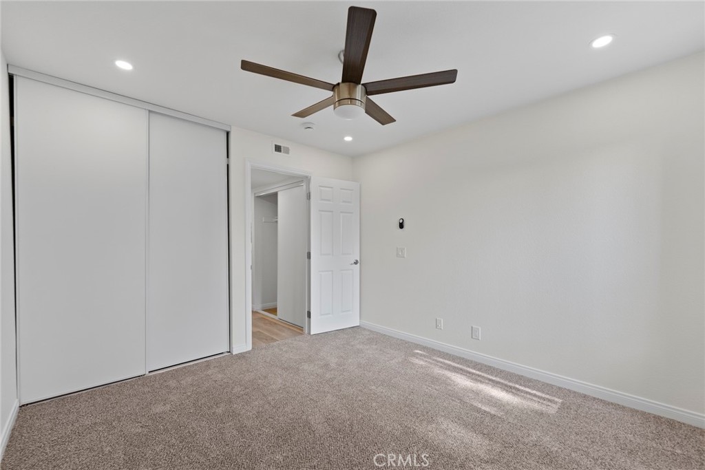 711 West 1st Street Santa Ana, CA 92701 - Photo 8 of 23 a view of a livingroom with a ceiling fan