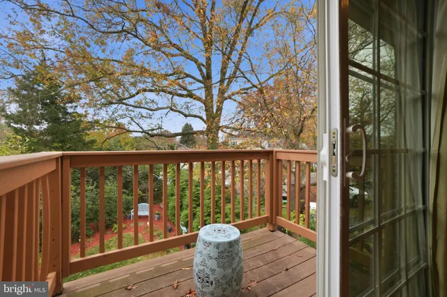 a balcony with wooden floor