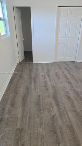 a view of an empty room with window