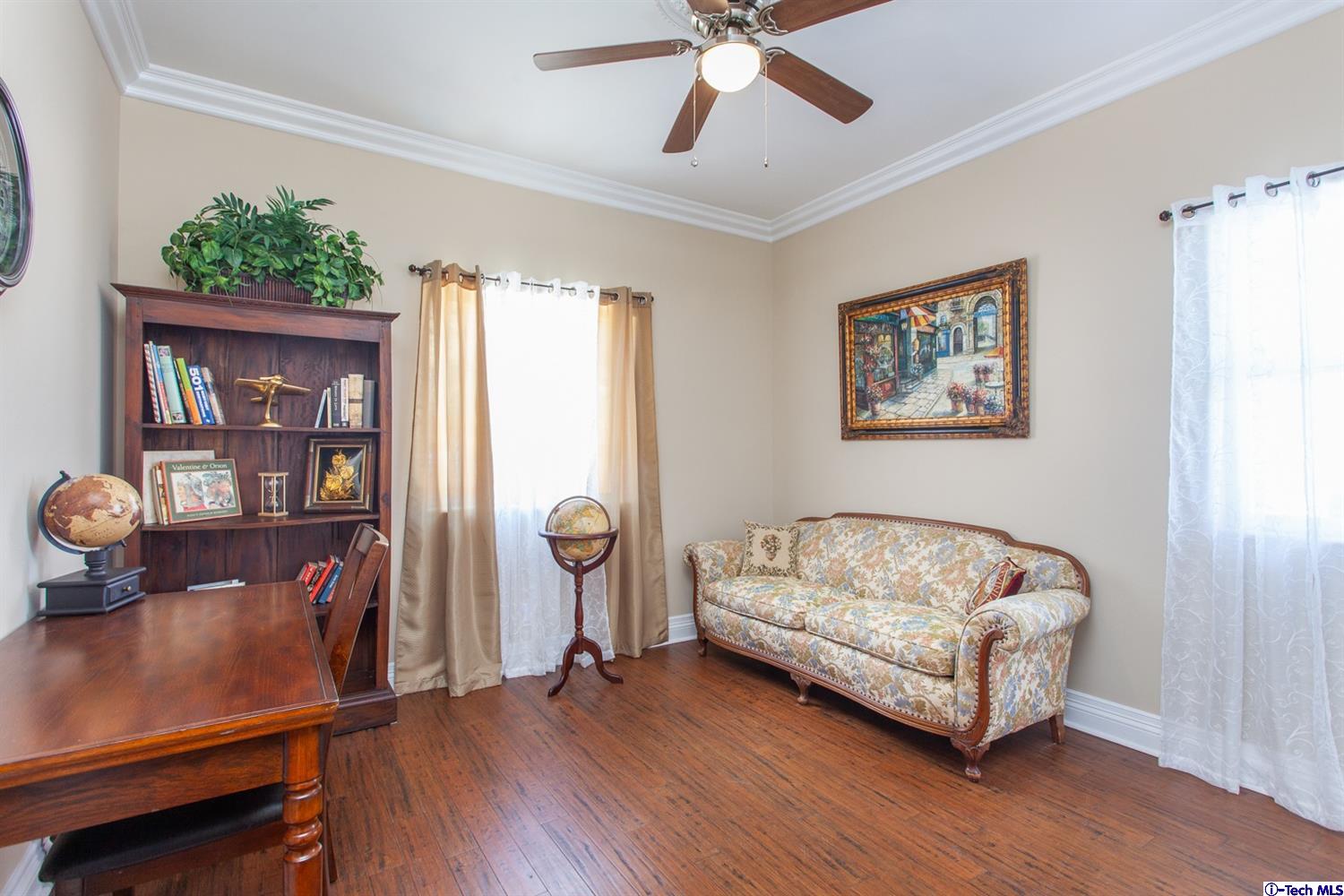 40251 Flintrock Road Leona Valley, CA 93551 - Photo 13 of 32 a spacious bedroom with a bed and a chandelier