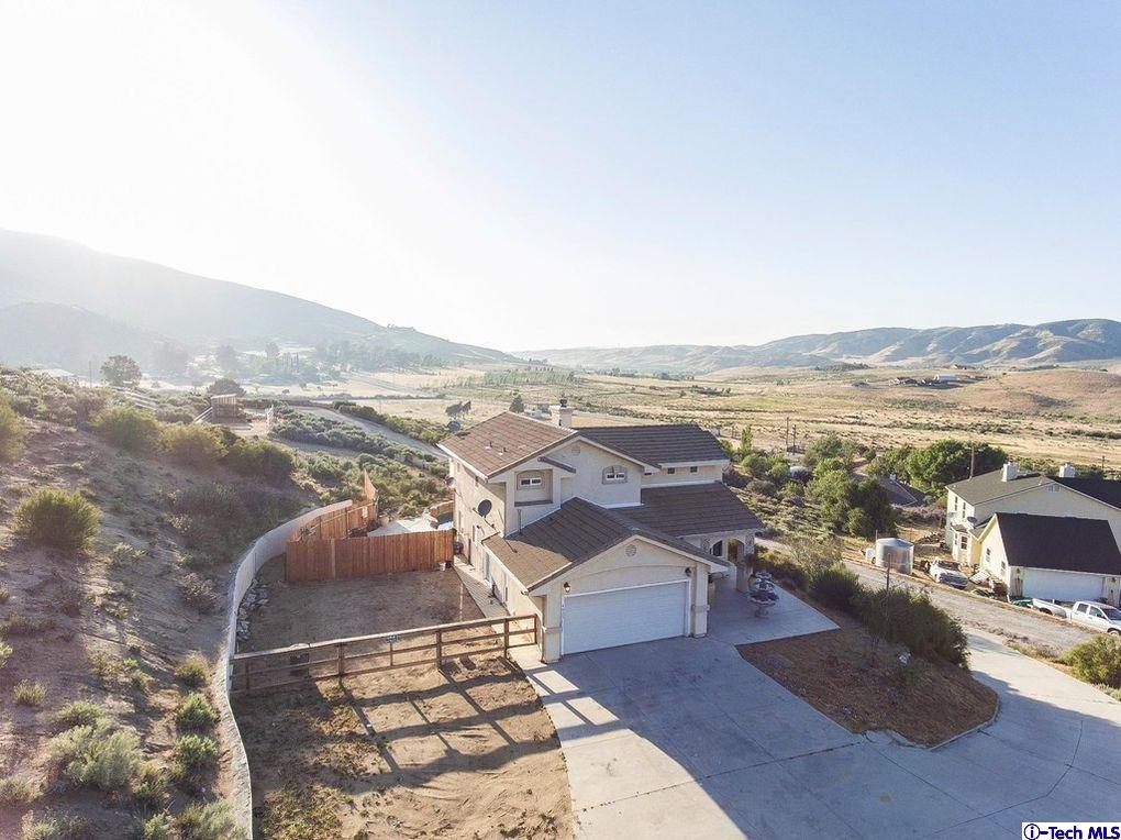 40251 Flintrock Road Leona Valley, CA 93551 - Photo 30 of 32 a view of a city from a terrace