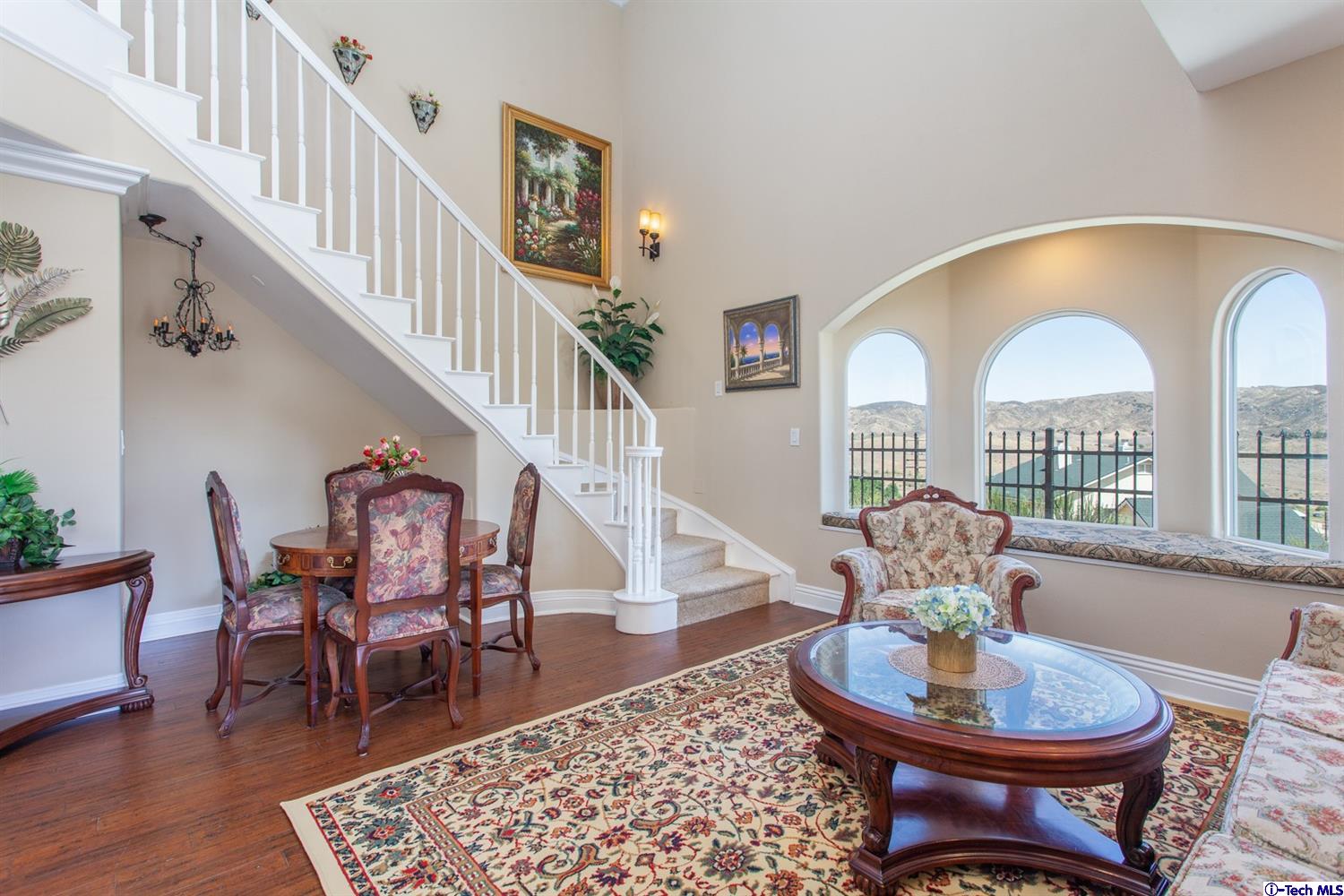 40251 Flintrock Road Leona Valley, CA 93551 - Photo 6 of 32 a living room with furniture a rug and a table