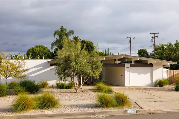 a picture of a houses with yard