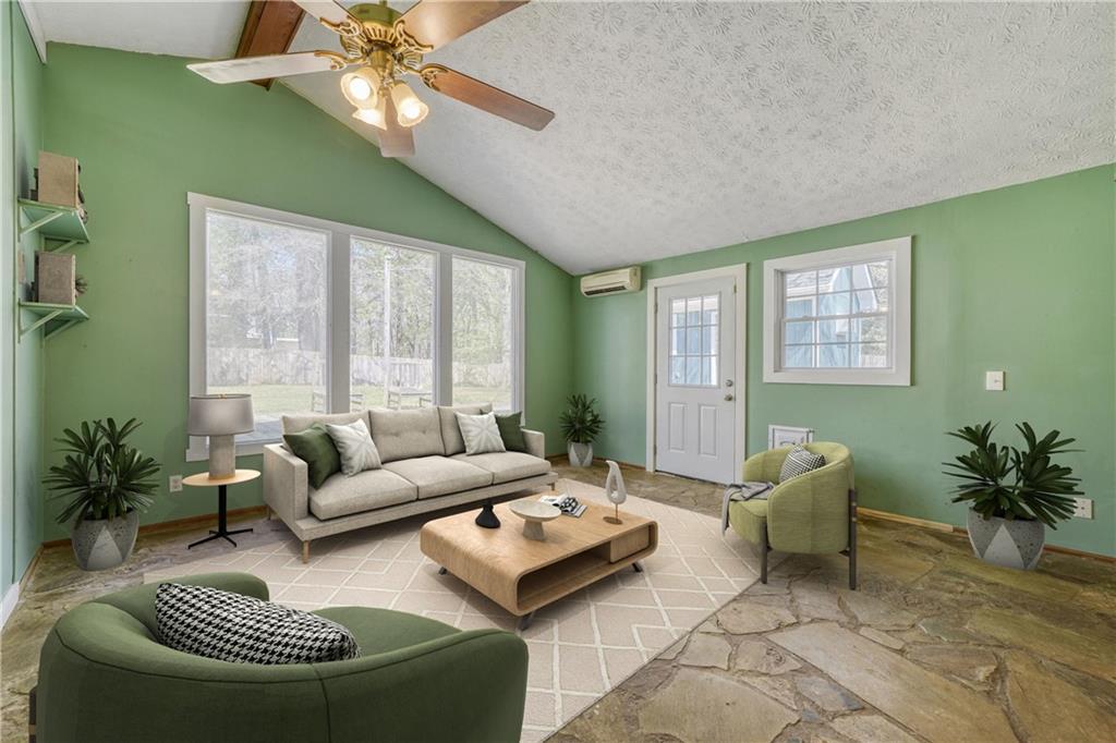 2754 Esquire Way Tucker, GA 30084 - Photo 11 of 49 a living room with furniture and a large window