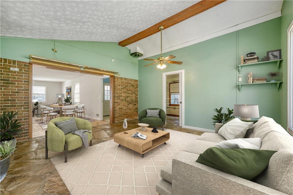 2754 Esquire Way Tucker, GA 30084 - Photo 12 of 49 a living room with furniture and a large window