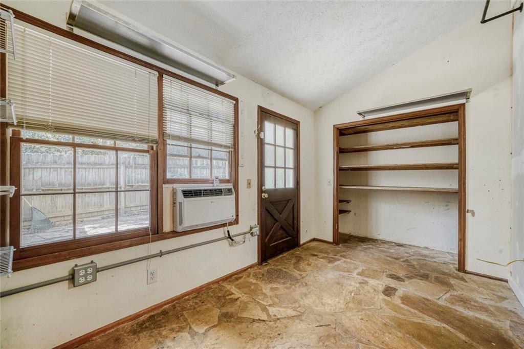 2754 Esquire Way Tucker, GA 30084 - Photo 21 of 49 a room with a bed and large window