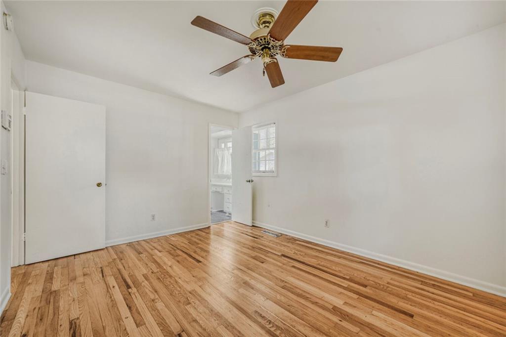 2754 Esquire Way Tucker, GA 30084 - Photo 25 of 49 wooden floor in an empty room