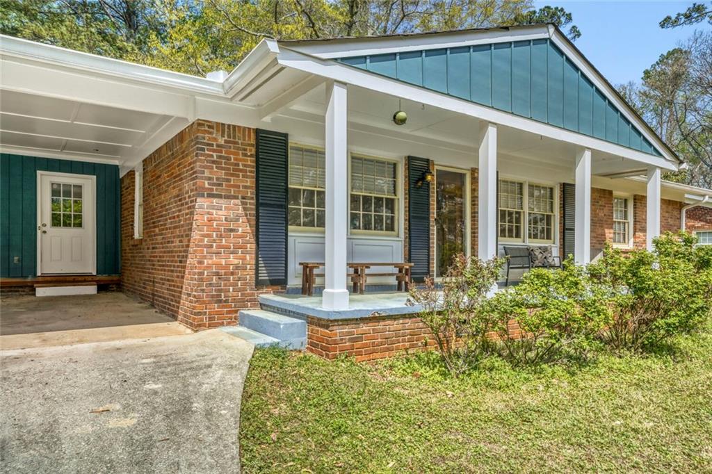 2754 Esquire Way Tucker, GA 30084 - Photo 3 of 49 front view of a house with a porch