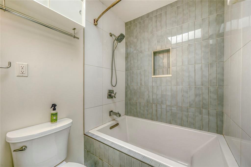 2754 Esquire Way Tucker, GA 30084 - Photo 33 of 49 a bathroom with a sink a toilet and shower