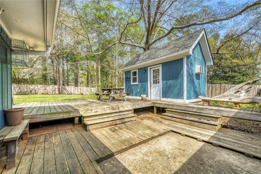 2754 Esquire Way Tucker, GA 30084 - Photo 37 of 49 a view of a house with swimming pool and sitting area