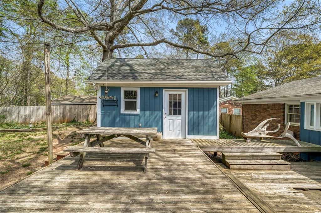 2754 Esquire Way Tucker, GA 30084 - Photo 38 of 49 a front view of a house with a yard