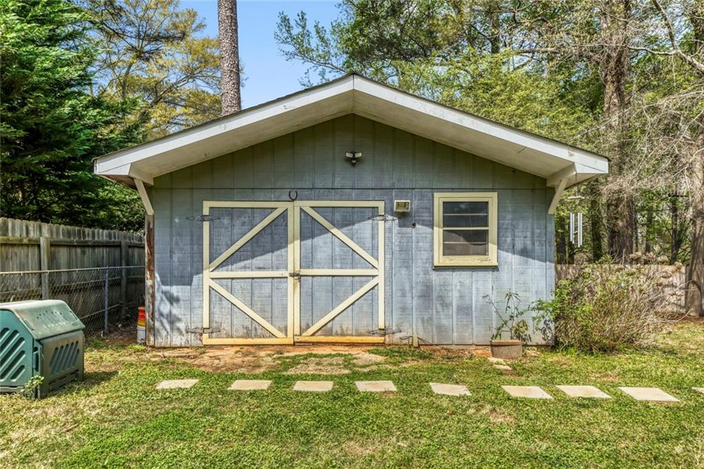 2754 Esquire Way Tucker, GA 30084 - Photo 41 of 49 a house with a yard