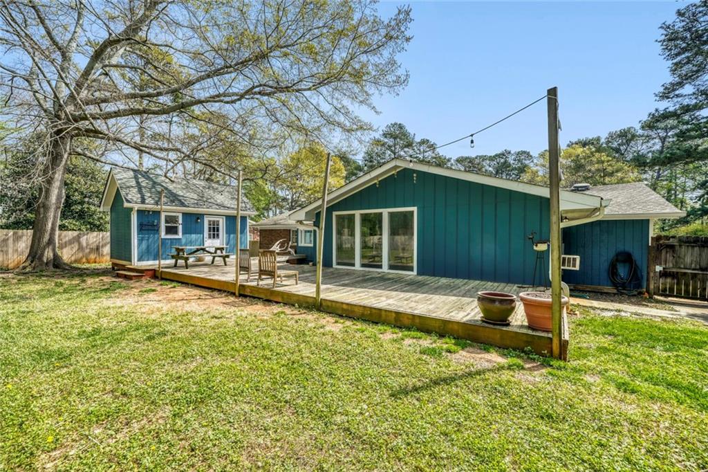2754 Esquire Way Tucker, GA 30084 - Photo 45 of 49 a house view with a seating space and garden