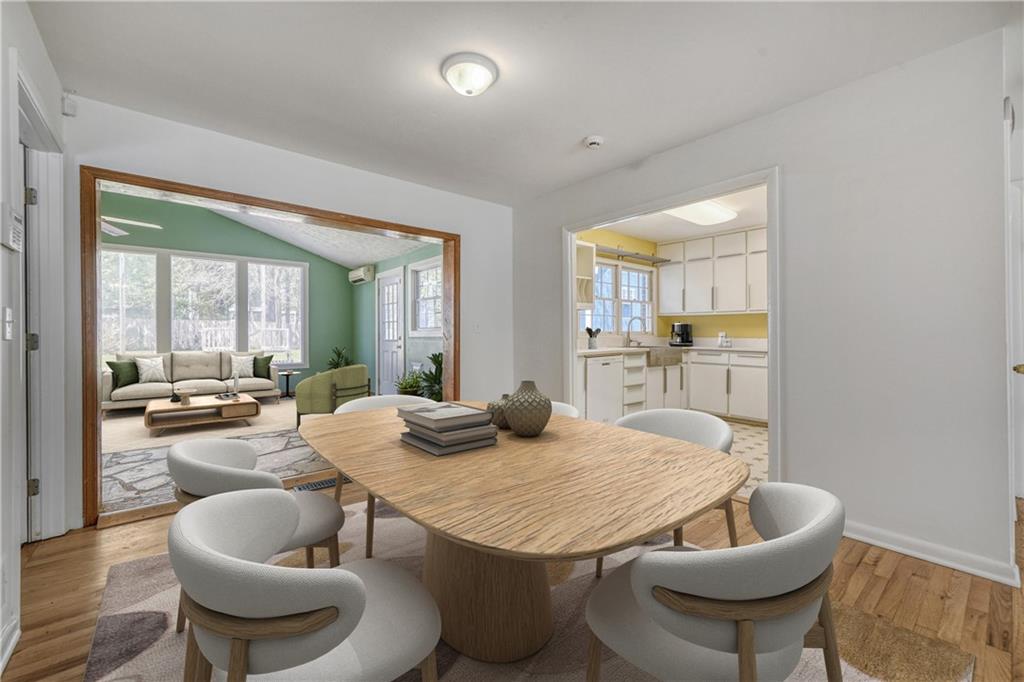 2754 Esquire Way Tucker, GA 30084 - Photo 7 of 49 a dining room with furniture and a large window