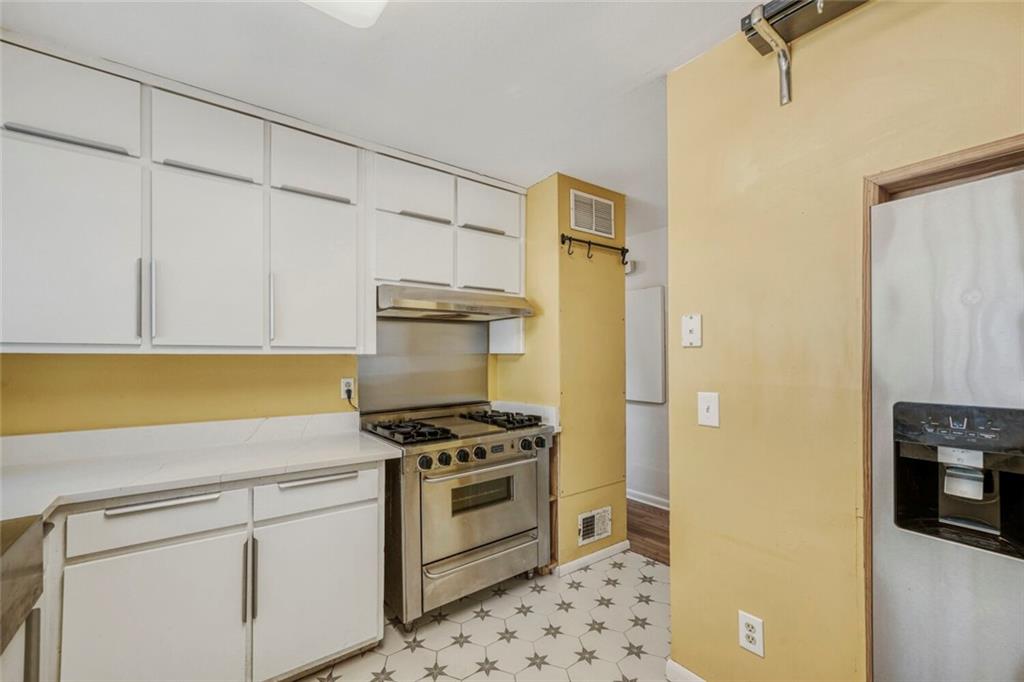 2754 Esquire Way Tucker, GA 30084 - Photo 9 of 49 a kitchen with cabinets and appliances