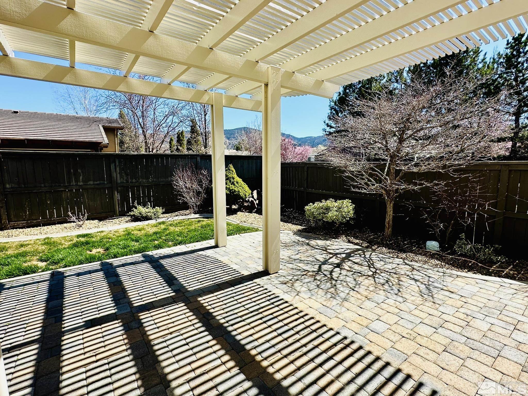 491 Oldenburg Drive Reno, NV 89521 - Photo 12 of 36 a view of a backyard with sitting area