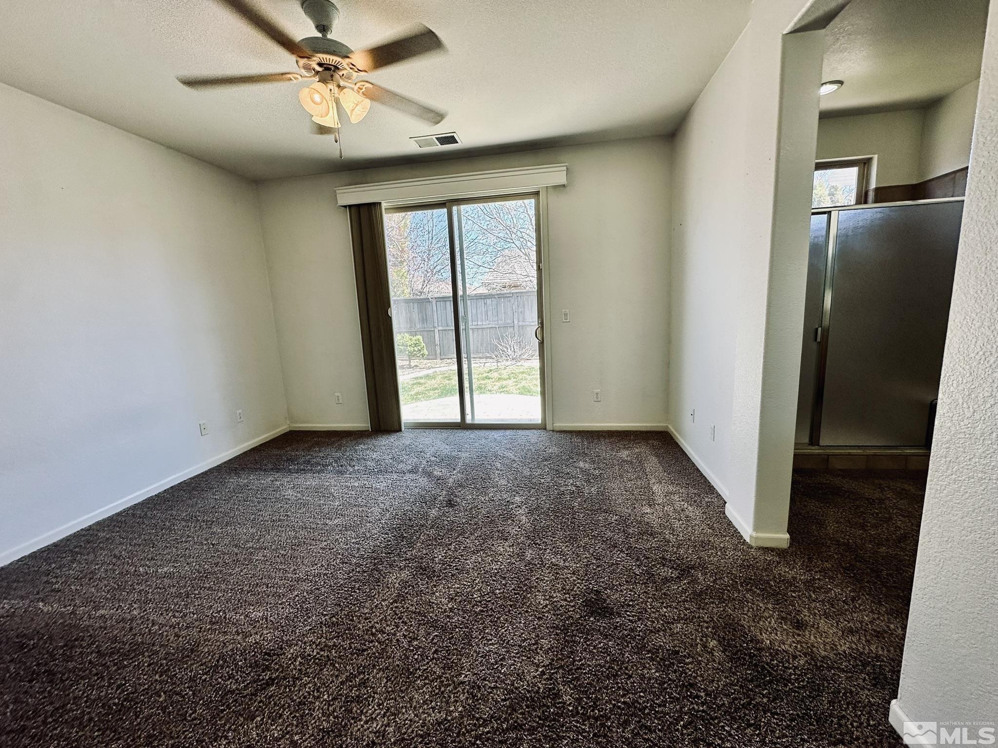 491 Oldenburg Drive Reno, NV 89521 - Photo 18 of 36 a view of an empty room with a window