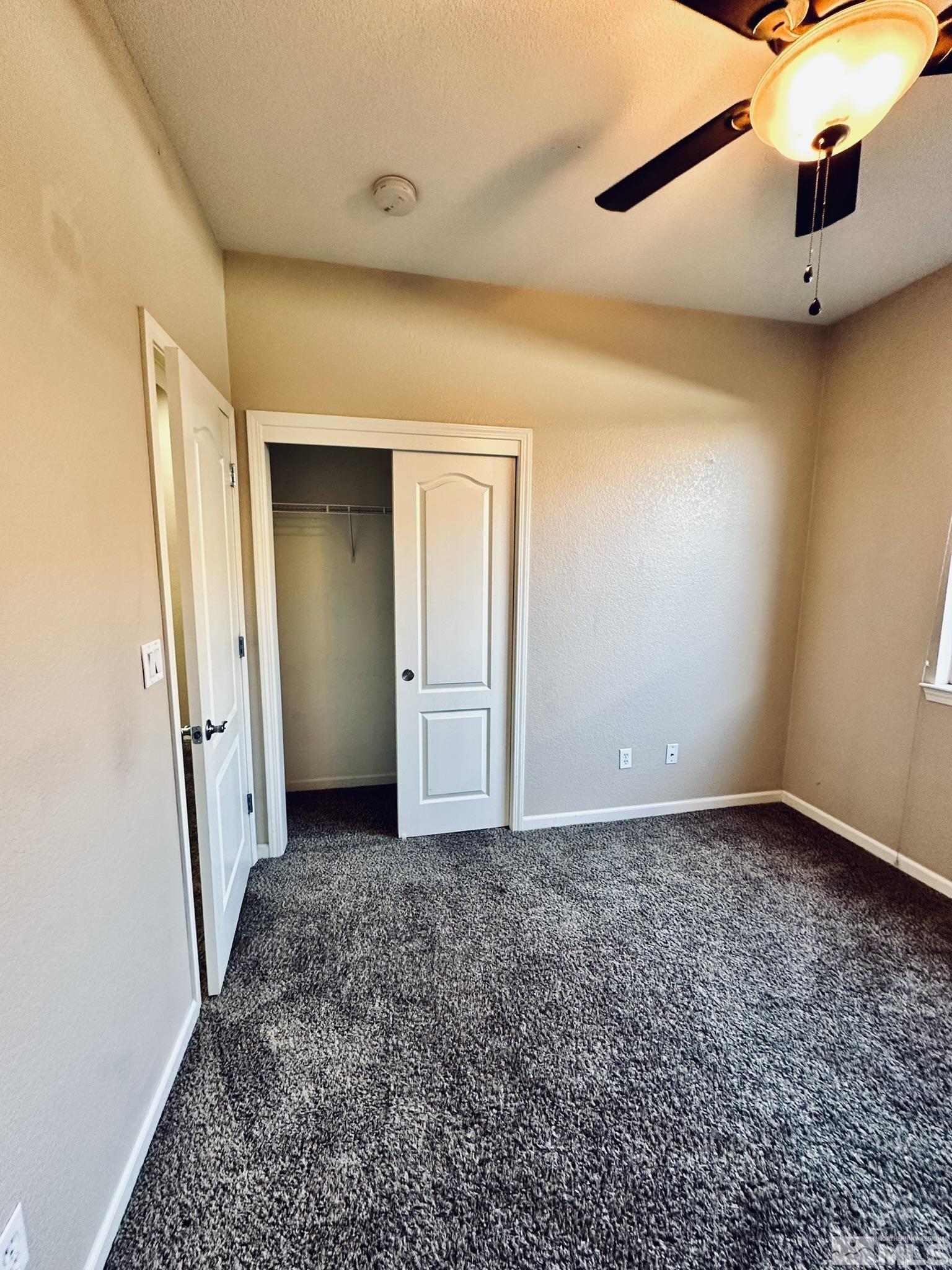 491 Oldenburg Drive Reno, NV 89521 - Photo 26 of 36 an empty room with a mirror